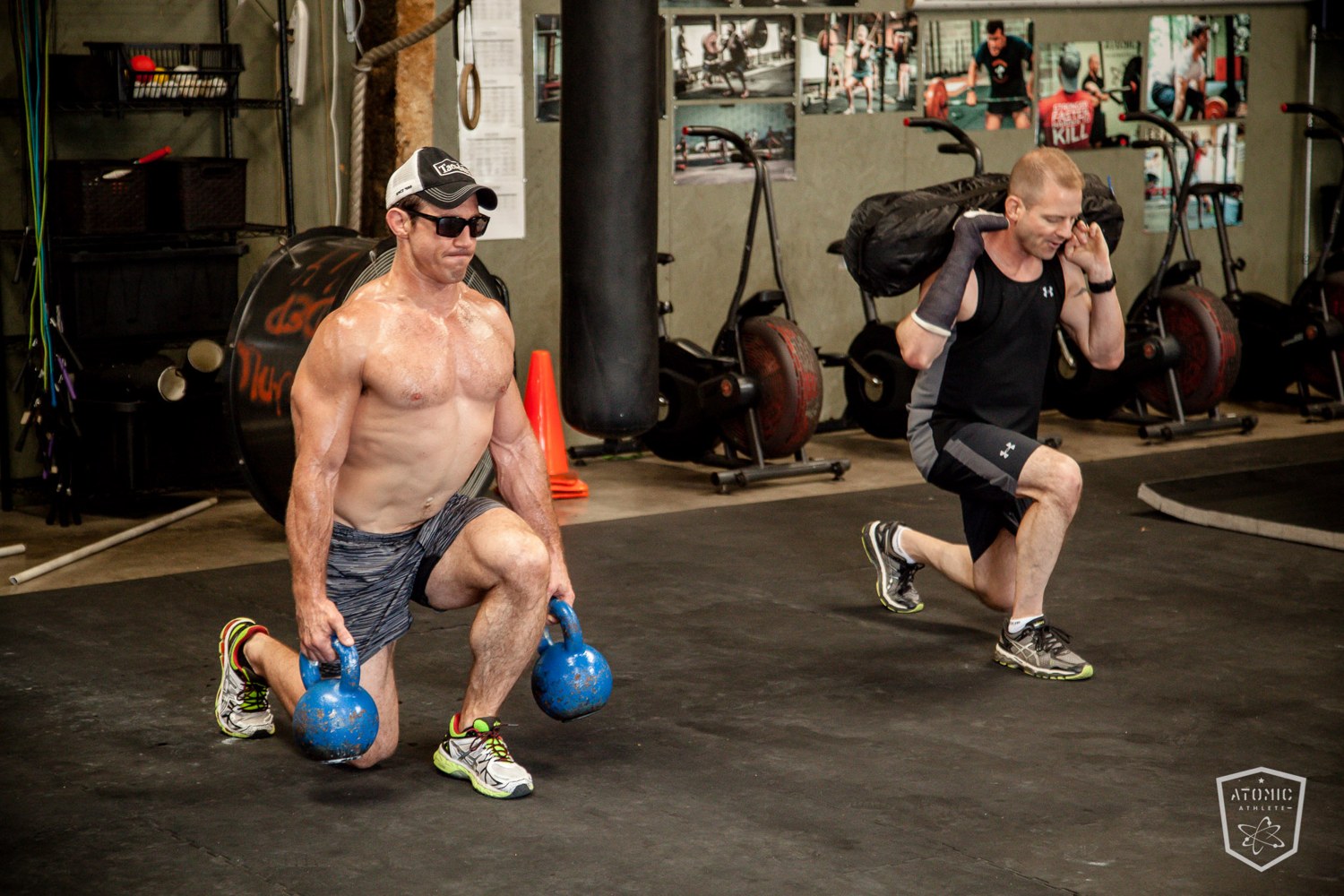 An athlete deep in a heavy kettlebell front squat, the kind of base-building work inside the bundle