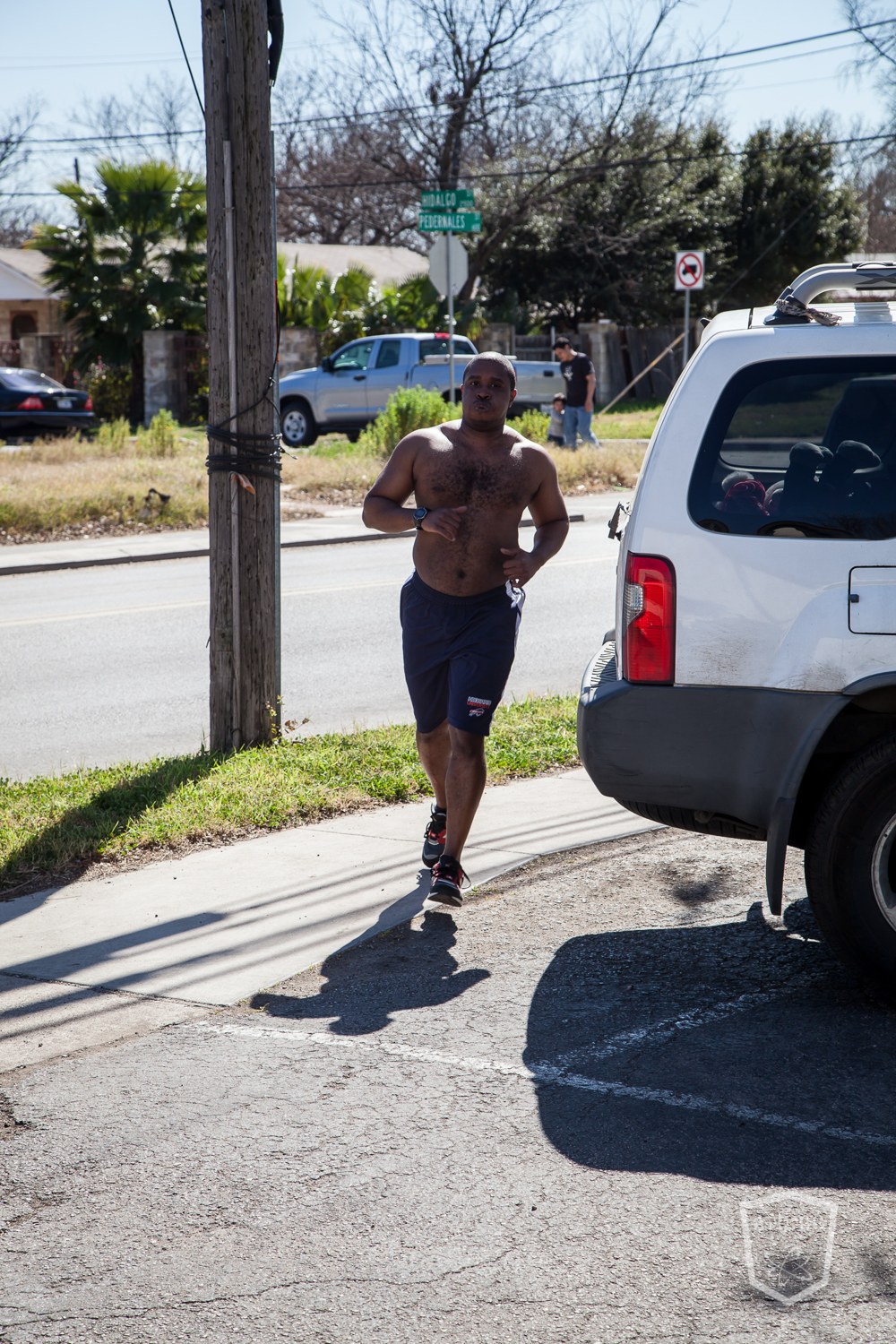 An athlete grinding through a hard outdoor run, building the engine that lasts deep into a match